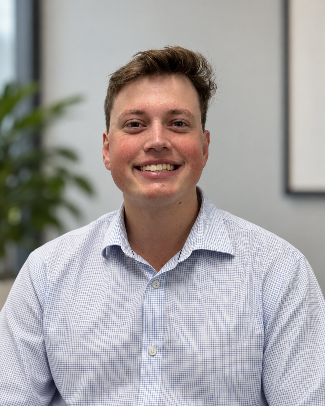 Max Storey, co-founder, wearing a checked shirt